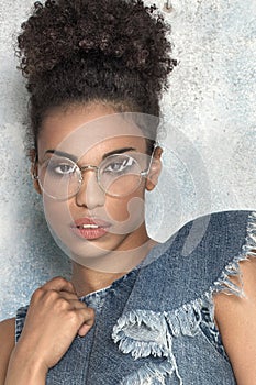 African american girl in eyeglasses.