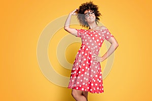 African american girl in red dress.