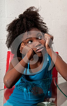 African American girl seated photo