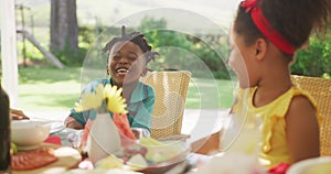 African American girl spending time in garden