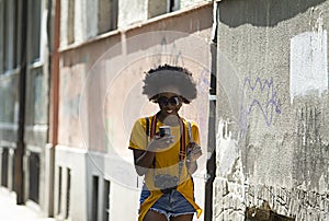 An African American girl on the street.A tourist in the city of Novi Sad.