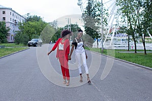 African American girls dance in the street