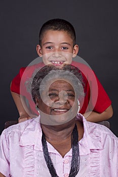 African American grandmother with her  grandson in an intimate and happy moment of warmth and affection