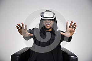 African American guy playing a vr game