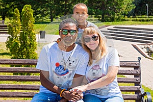 African American happy family: black father, mom and baby boy on nature. Use it for a child, parenting or love concept