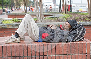 African american homeless man sleeping