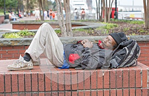 African american homeless man sleeping photo