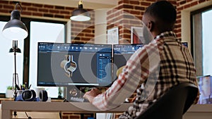 African american industrial designer works on prototypes in a creative studio photo