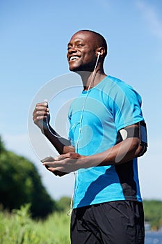 African american male runner smiling