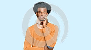 African american man with afro hair wearing cervical neck collar thinking looking tired and bored with depression problems with