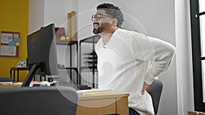 African american man business worker working suffering for backache at office