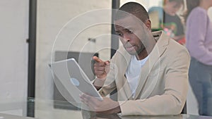 African American Man Doing Video Talk on Digital Tablet