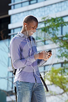 African american man enjoying music on his mobile phone