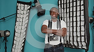 African american man having backstage photography equipment