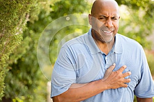 African American man having heart pains.