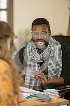 African American Man Laughing with Colleague or Client