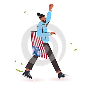African american man with raised up fist holding usa flag black lives matter concept racial discrimination