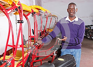 African-American man recommending rickshaw