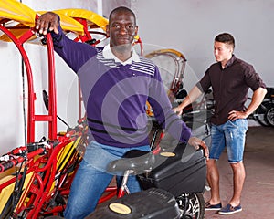 African-American man recommending rickshaw