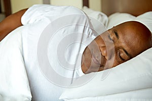 African American man sleeping.