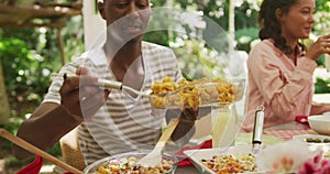 African American man spending time in garden