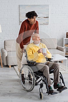 African american man standing near granddad