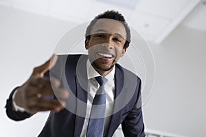 African American man stretching hand