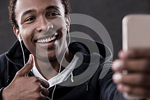 African American man taking selfie