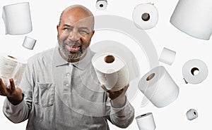African American man with toilet paper during Corona Virus crisis. Dark Humor with copy space