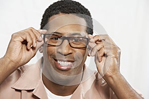 African American Man Trying On Glasses photo