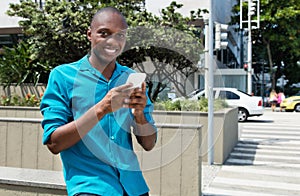 African american man using 4g with mobile phone