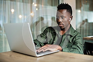 African american man using computer