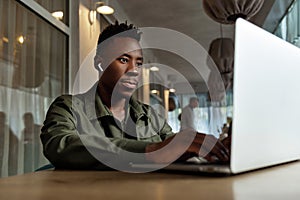 African american man using computer