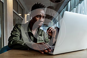 African american man using computer