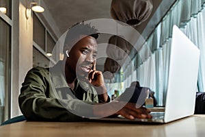 African american man using computer