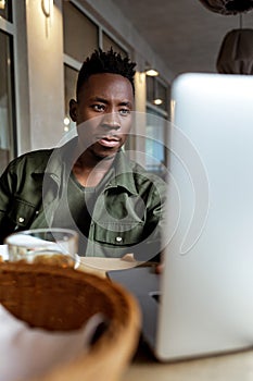 African american man using computer