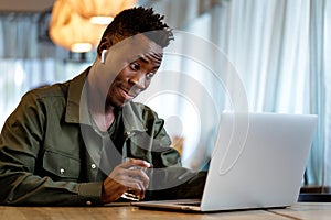 African american man using computer