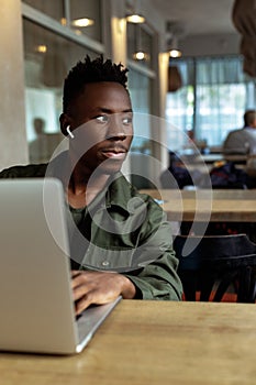 African american man using computer