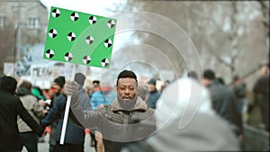 African american man walk. Afro black human. Crowd fight on political strike. photo