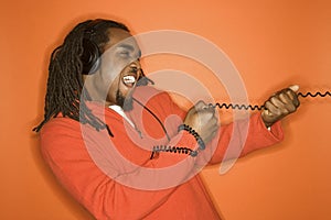 African-American man wearing headphones.