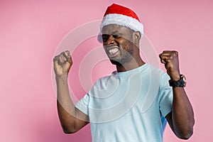 African american man wearing Santa hat