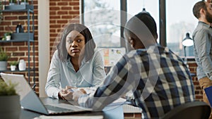 African american man and woman attendng job interview