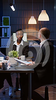 African american manager woman discussing financial graphs presentation