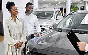 African american married couple came to look at car for future purchase