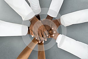African American Medical Team Hands Stack