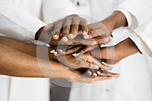 African American Medical Team Hands Stack