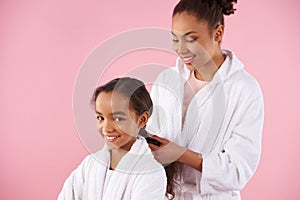 African American mother braids plait of little