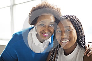 African American mother and daughter close portrait