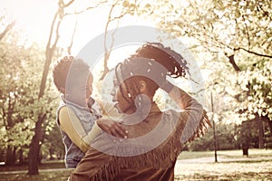 African American mother in nature with daughter.