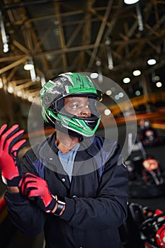 african american motorsports driver in helmet photo